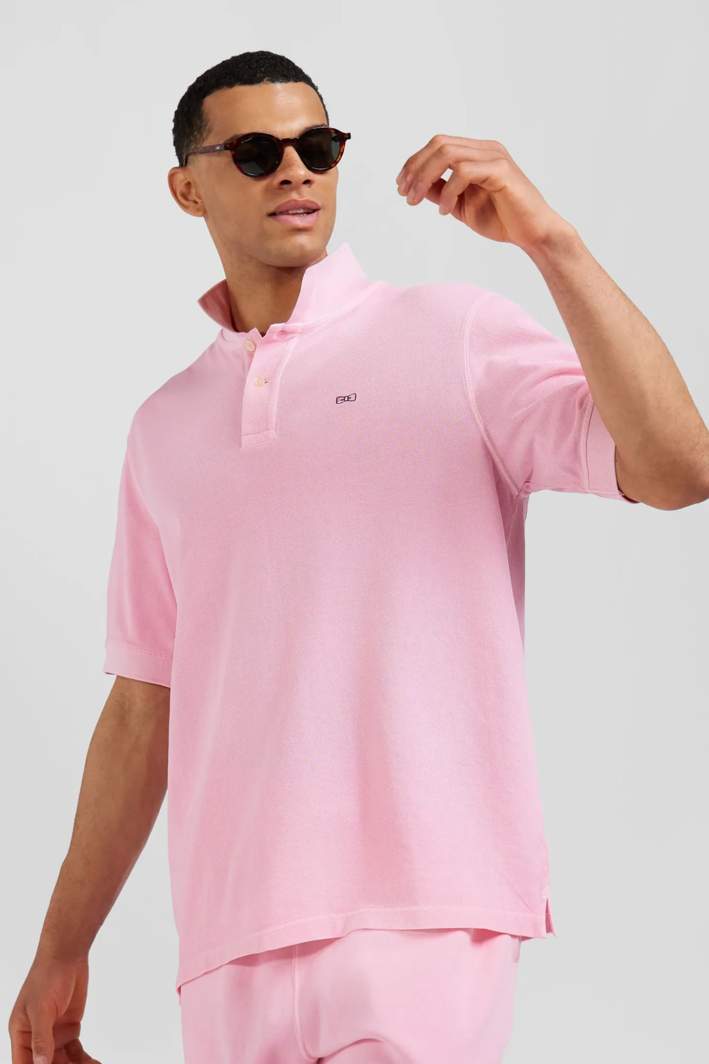 Oversized pink unisex short-sleeved cotton piqué polo shirt