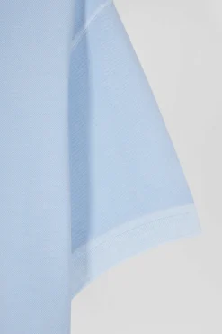 Oversized sky blue unisex short-sleeved cotton piqué polo shirt