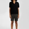 Regular black short-sleeved wool polo neck jumper