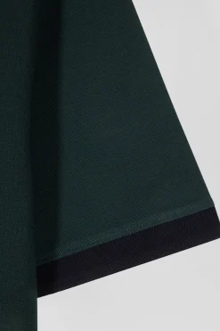 Regular green short-sleeved cotton piqué polo shirt