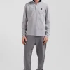 Regular grey long-sleeved cotton piqué polo shirt with rubber badge