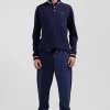 Regular navy blue long-sleeved cotton piqué polo shirt with rubber badge