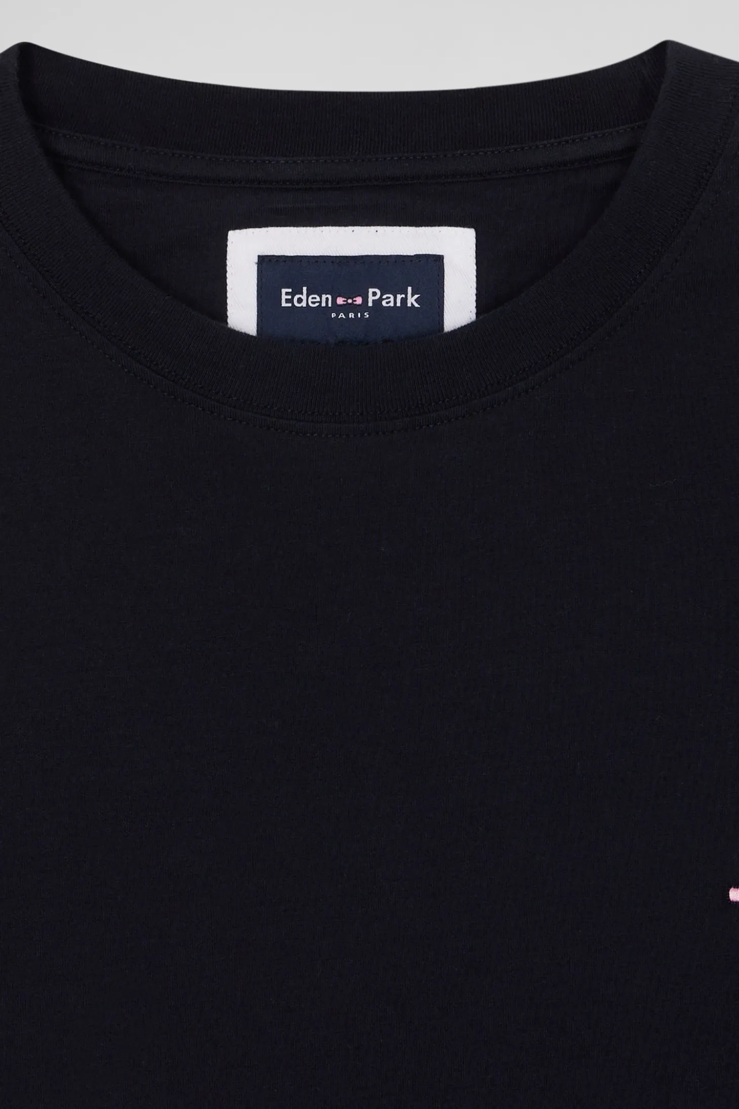 Regular navy blue long-sleeved cotton T-shirt with floral back patch