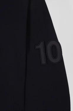 Regular navy blue long-sleeved cotton piqué polo shirt with padded embroidery