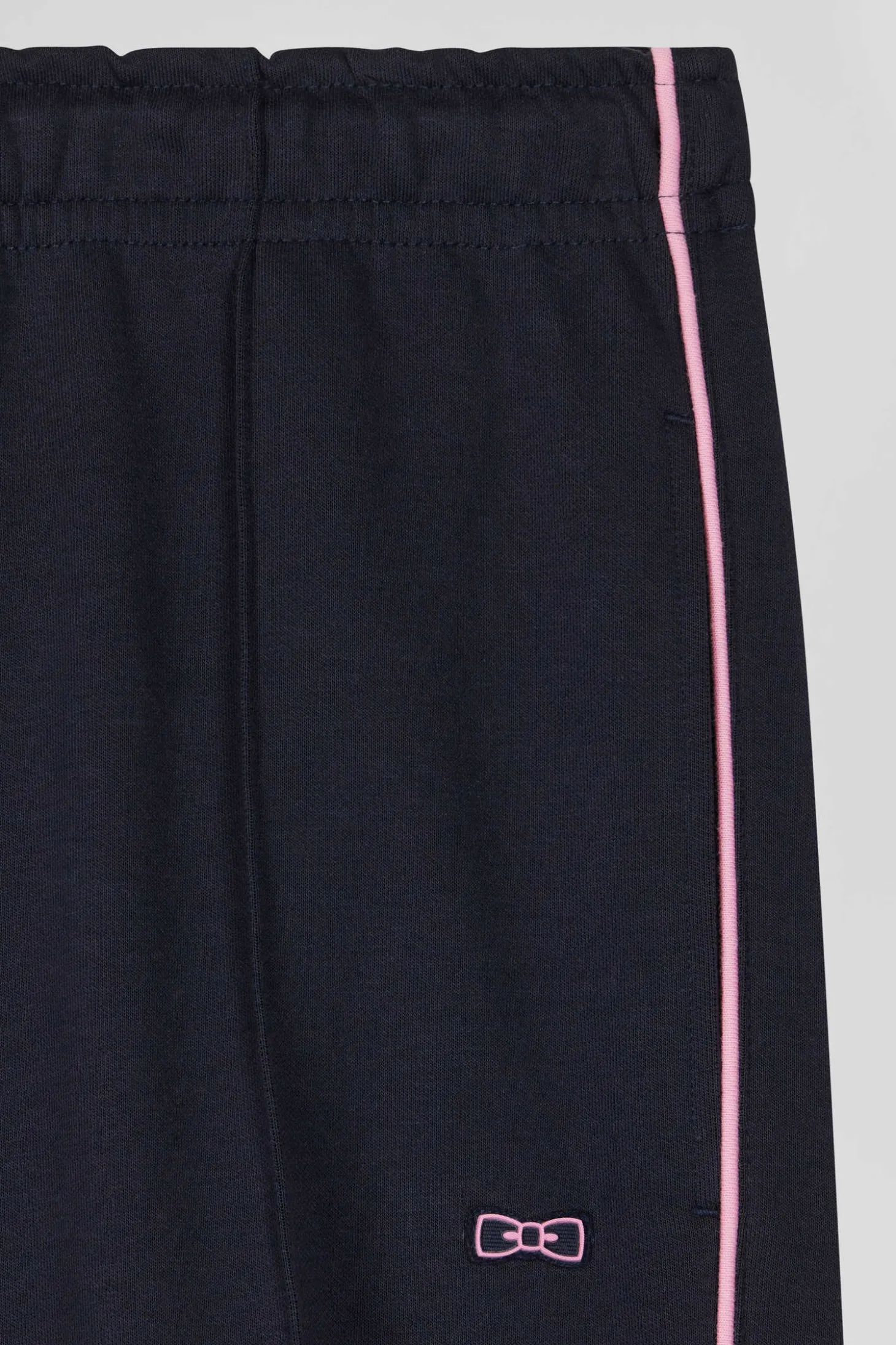 Regular navy blue mixed cotton jogging bottoms with pink piping
