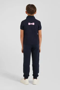 Regular navy blue short-sleeved cotton piqué polo shirt with back bow tie embroidery