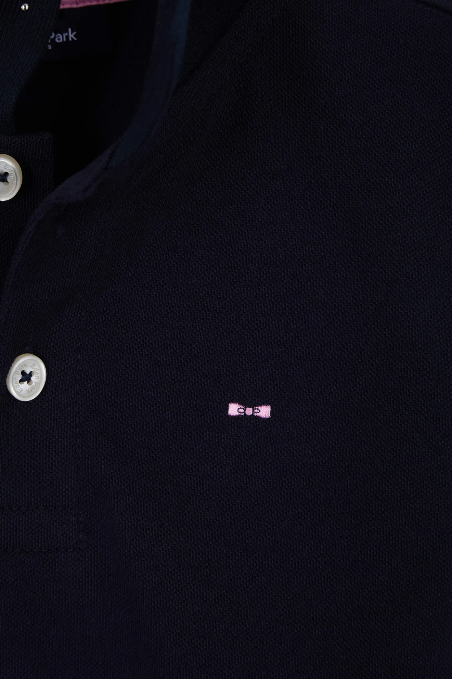 Regular navy blue short-sleeved cotton piqué polo shirt with back bow tie embroidery