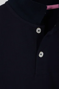 Regular navy blue short-sleeved cotton piqué polo shirt with back bow tie embroidery