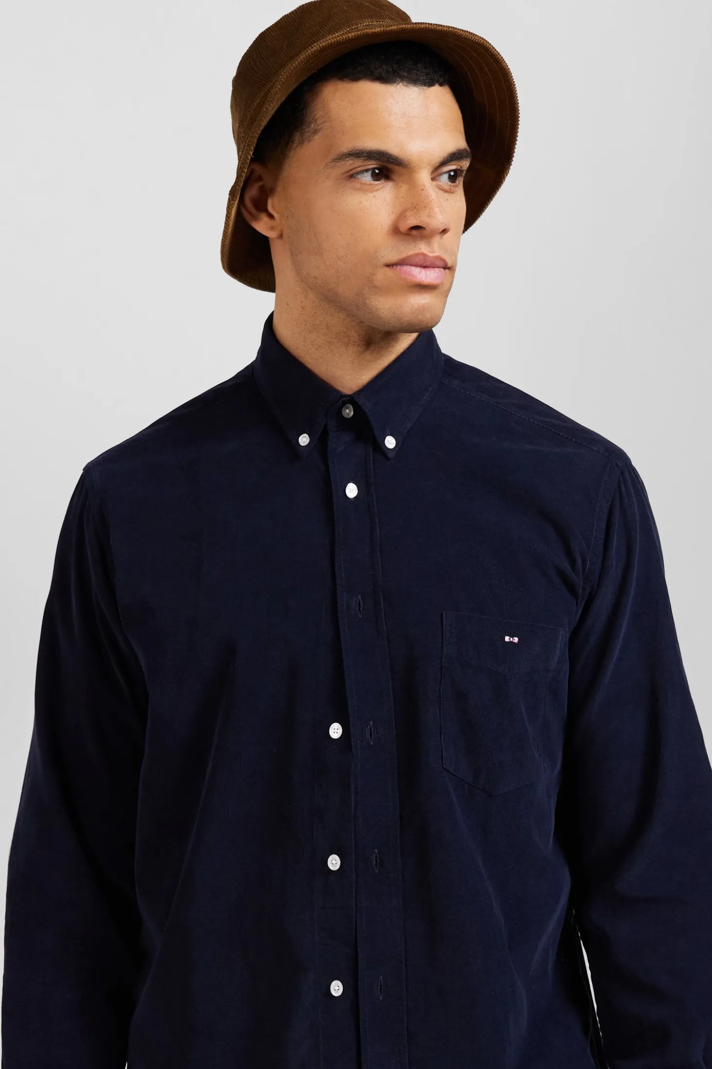 Regular plain navy blue cotton shirt with button-down collar and chest pocket