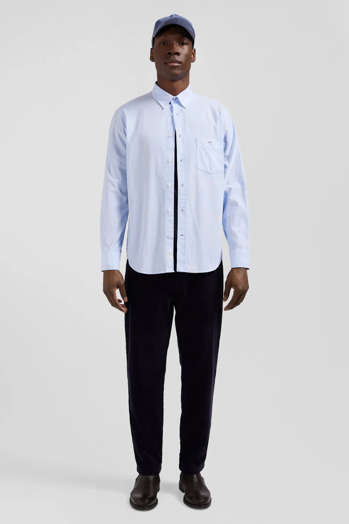 Regular plain sky blue cotton shirt with button-down collar and chest pocket