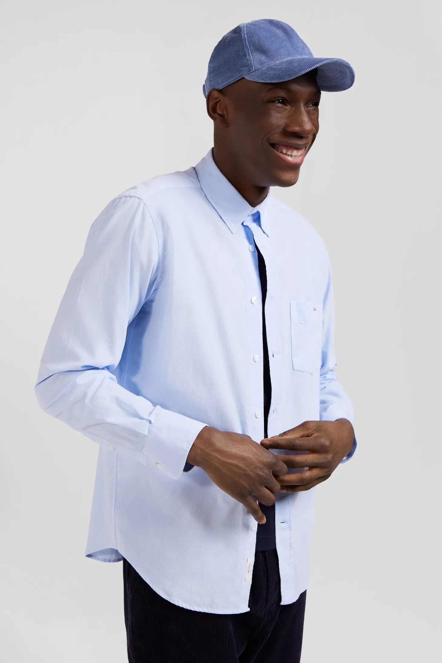 Regular plain sky blue cotton shirt with button-down collar and chest pocket