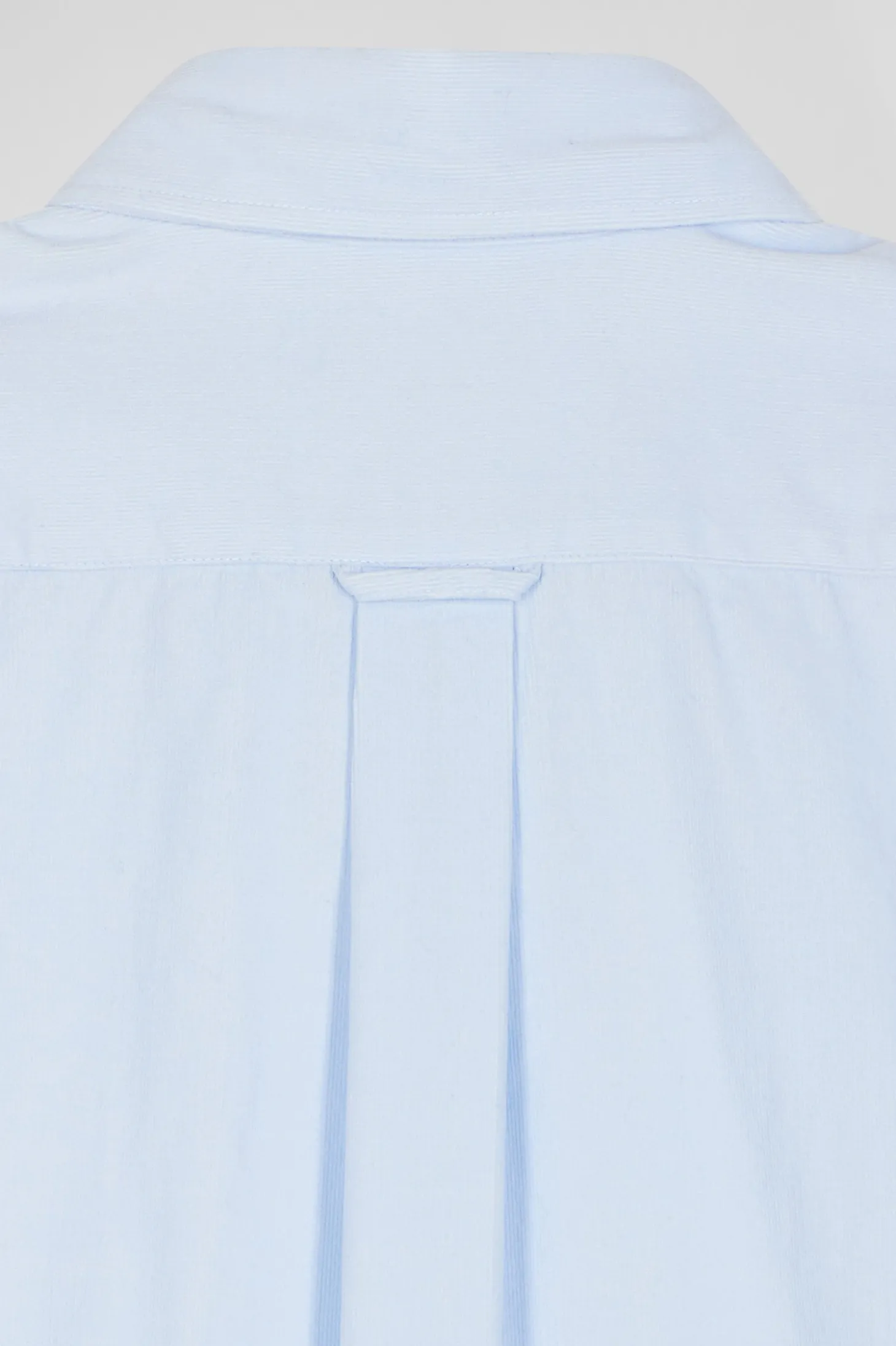 Regular plain sky blue cotton shirt with button-down collar and chest pocket