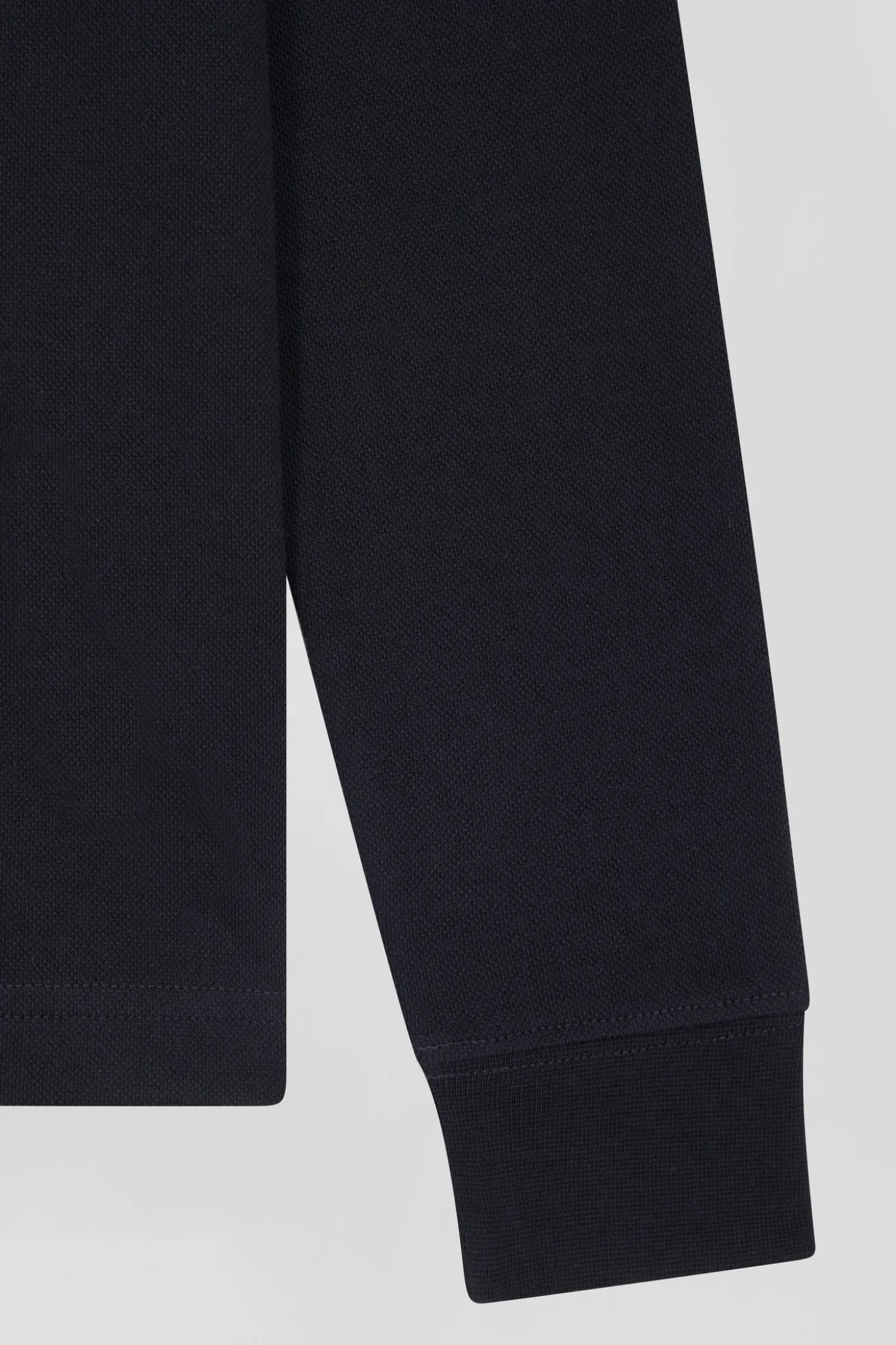 Slim black long-sleeved stretch cotton polo shirt with striped collar