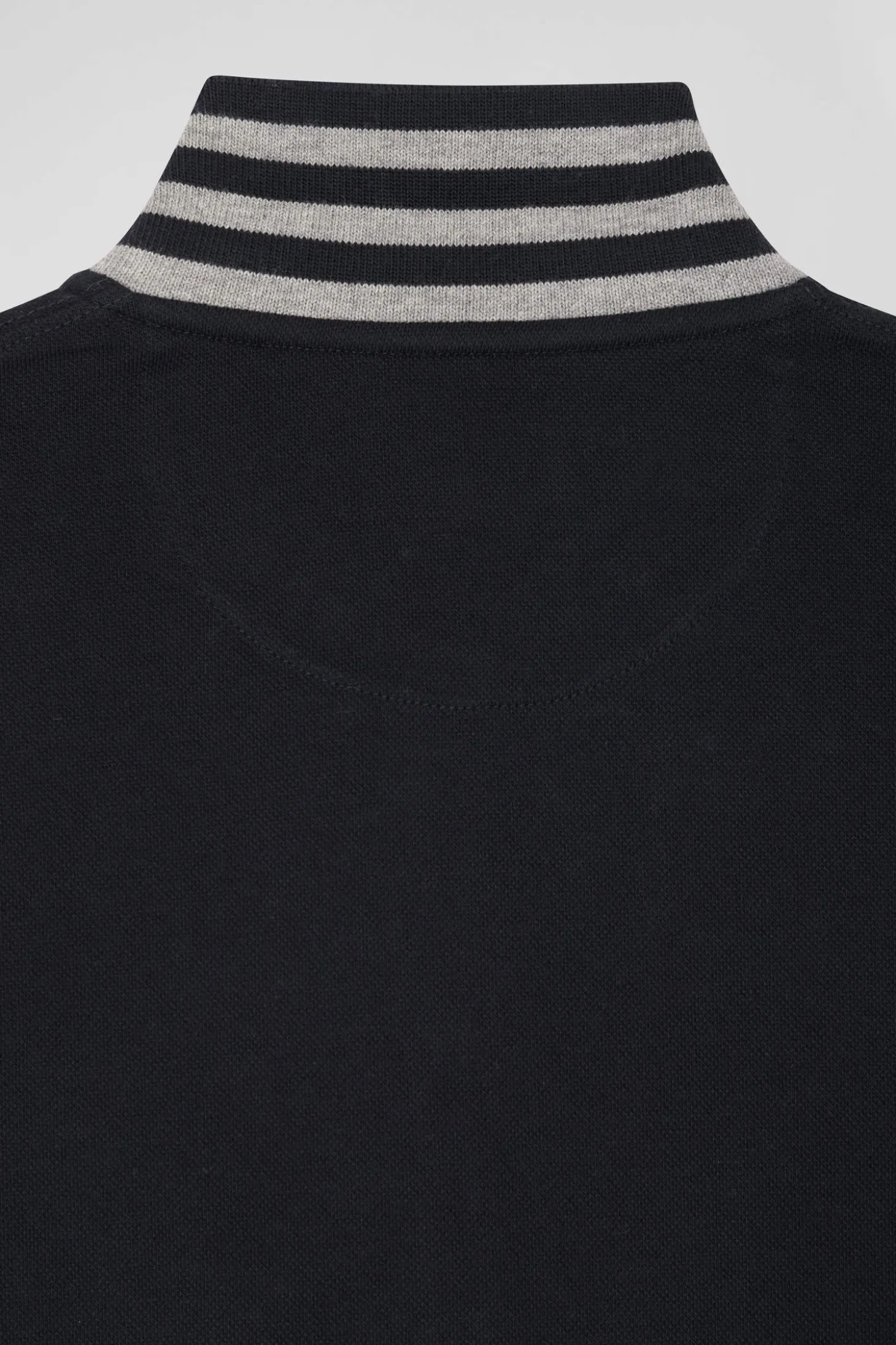 Slim black long-sleeved stretch cotton polo shirt with striped collar
