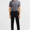 Slim black wool trousers with broken fold