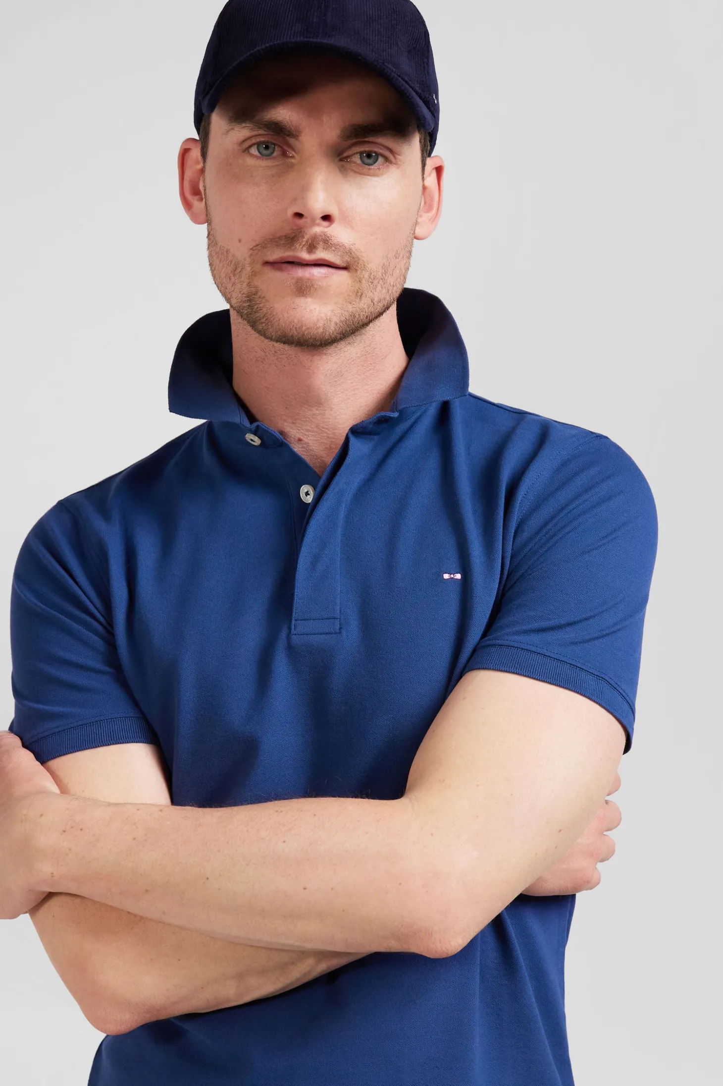 Slim dark blue short-sleeved stretch cotton polo shirt