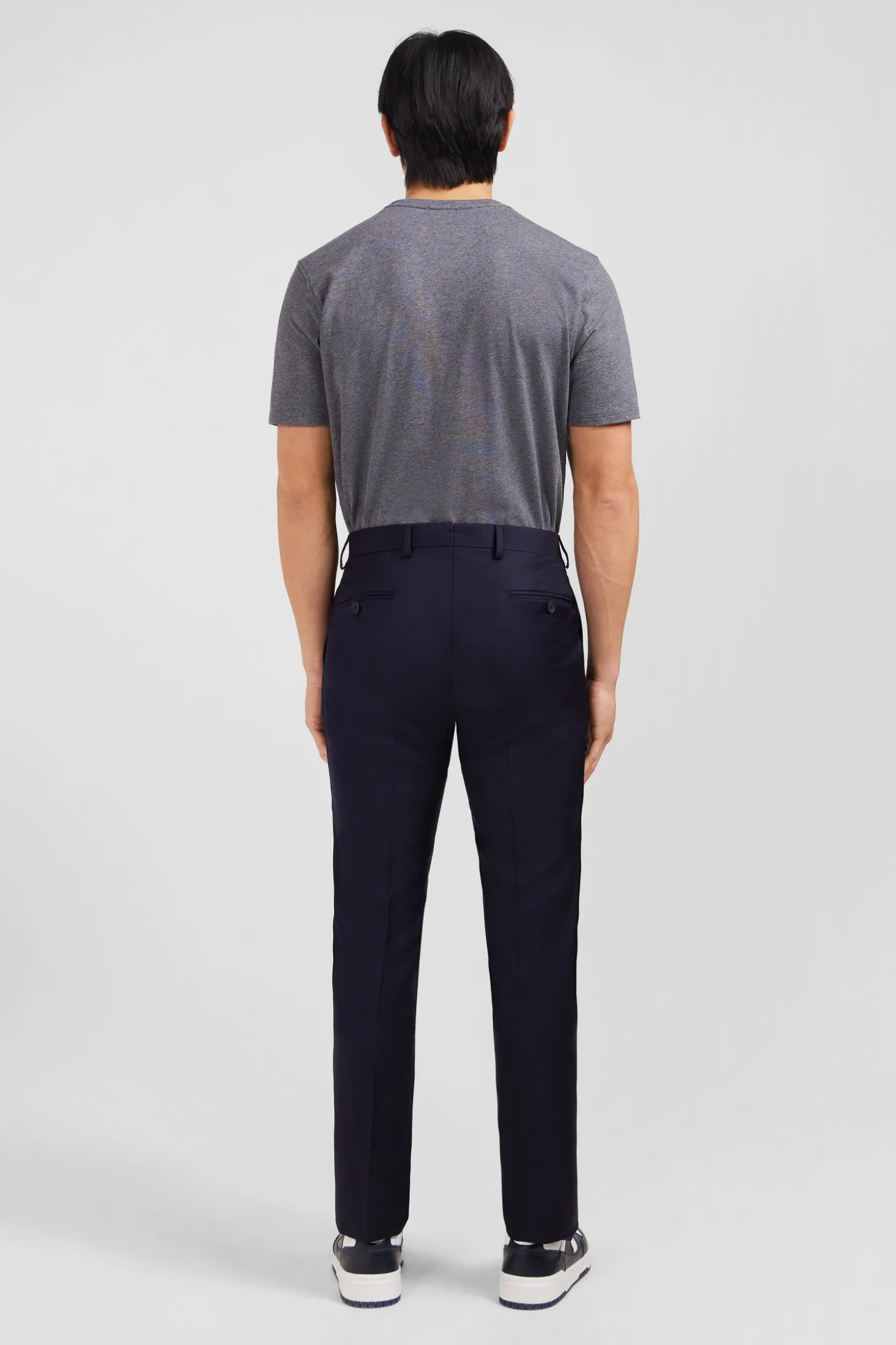 Slim dark blue wool trousers with broken fold