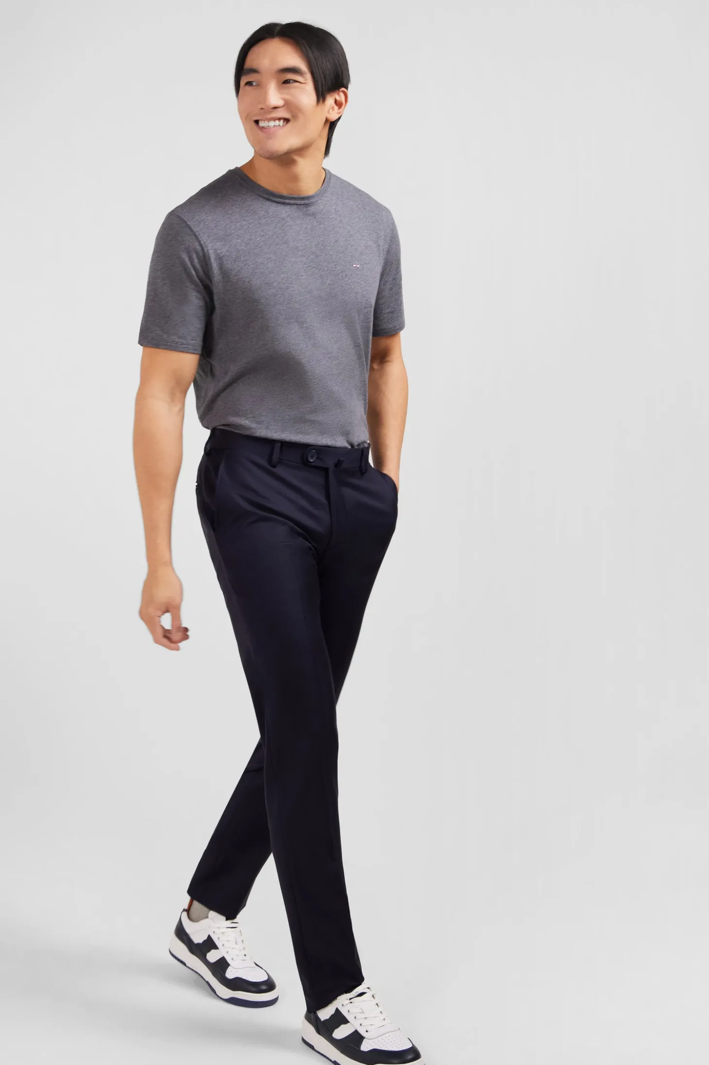 Slim dark blue wool trousers with broken fold