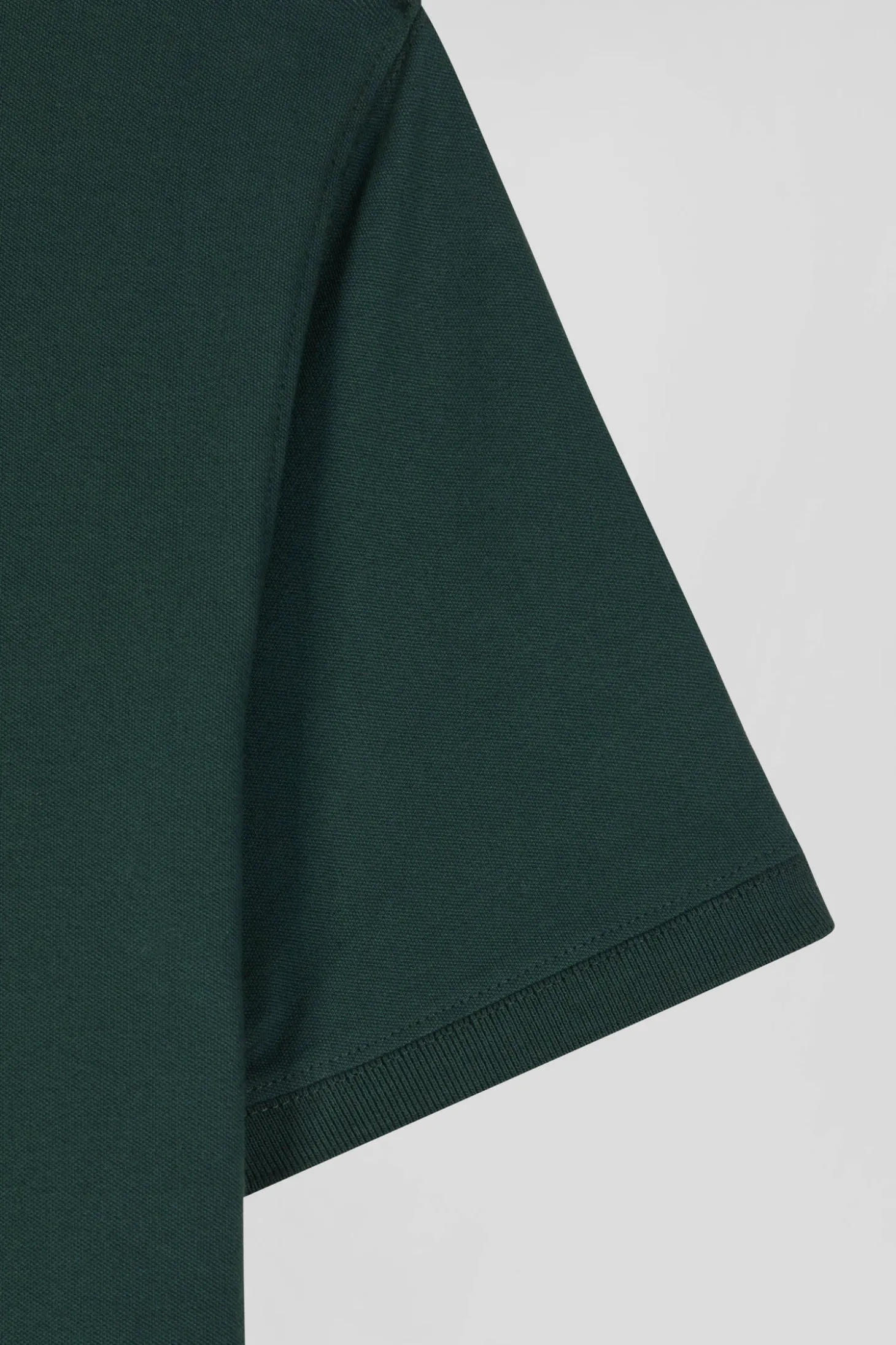 Slim green short-sleeved cotton piqué polo shirt