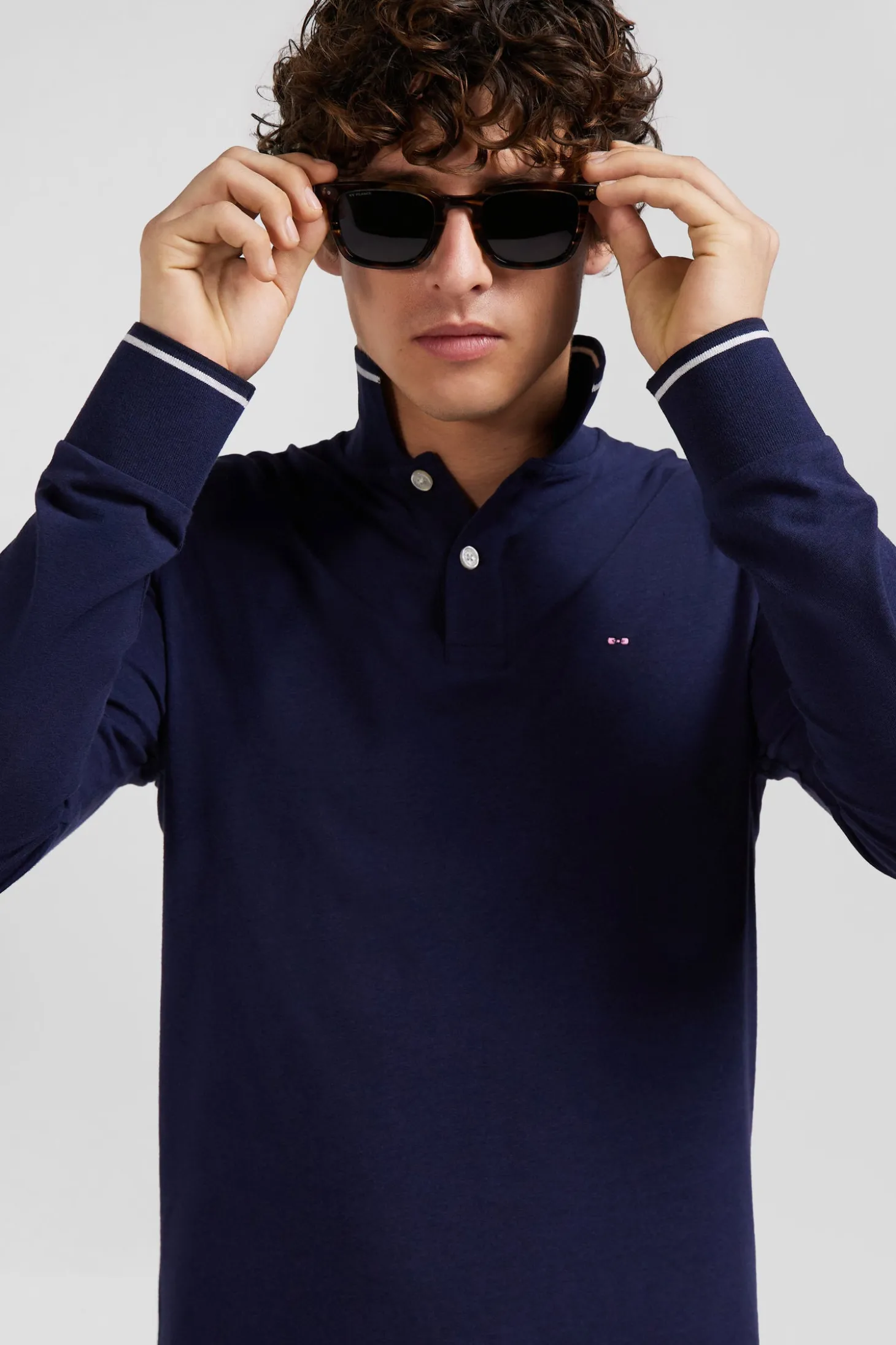Slim navy blue long-sleeved stretch cotton polo shirt with striped finishes