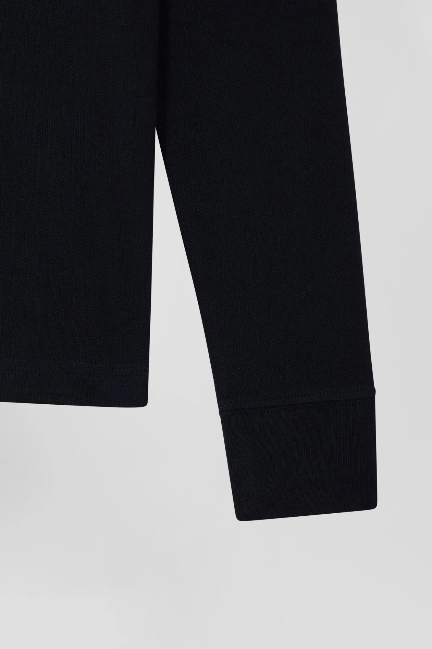 Slim navy blue long-sleeved stretch cotton polo shirt with striped collar