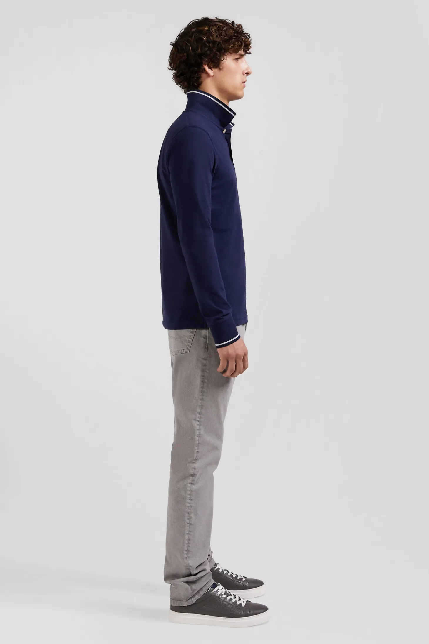 Slim navy blue long-sleeved stretch cotton polo shirt with striped finishes