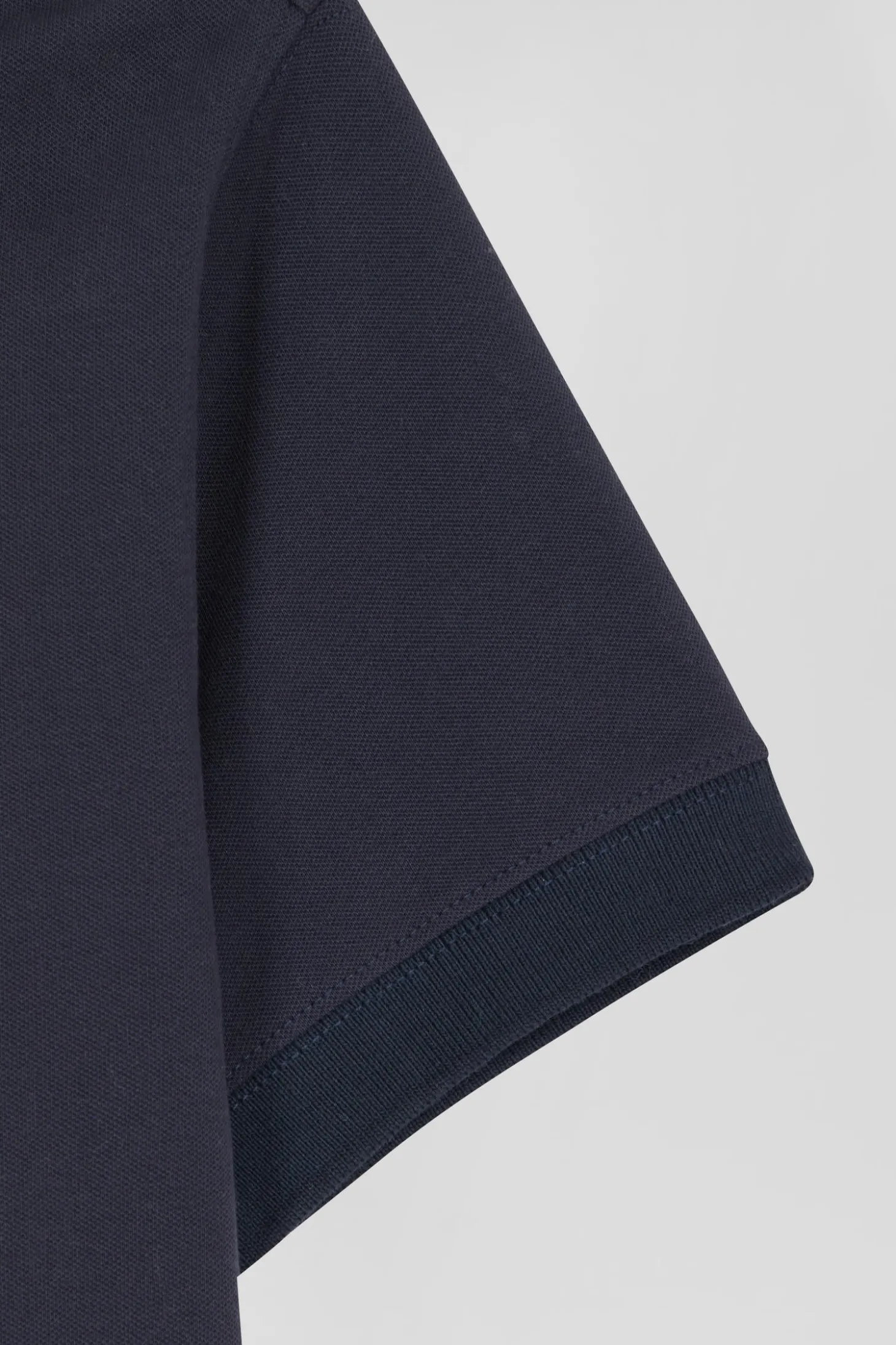 Slim navy blue plain stretch cotton short-sleeved polo shirt