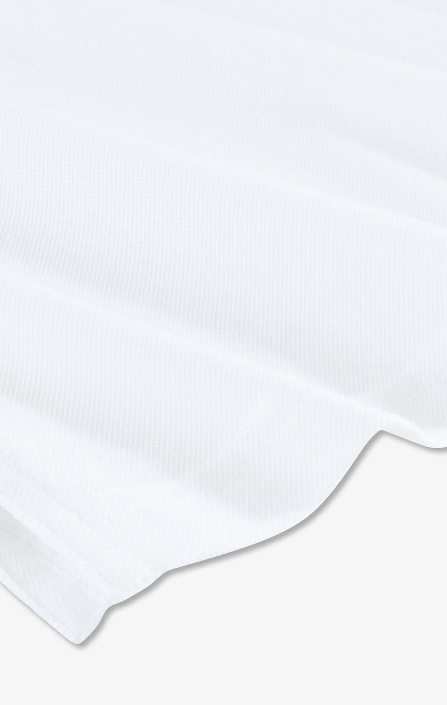 White pima cotton polo with contrasting accents